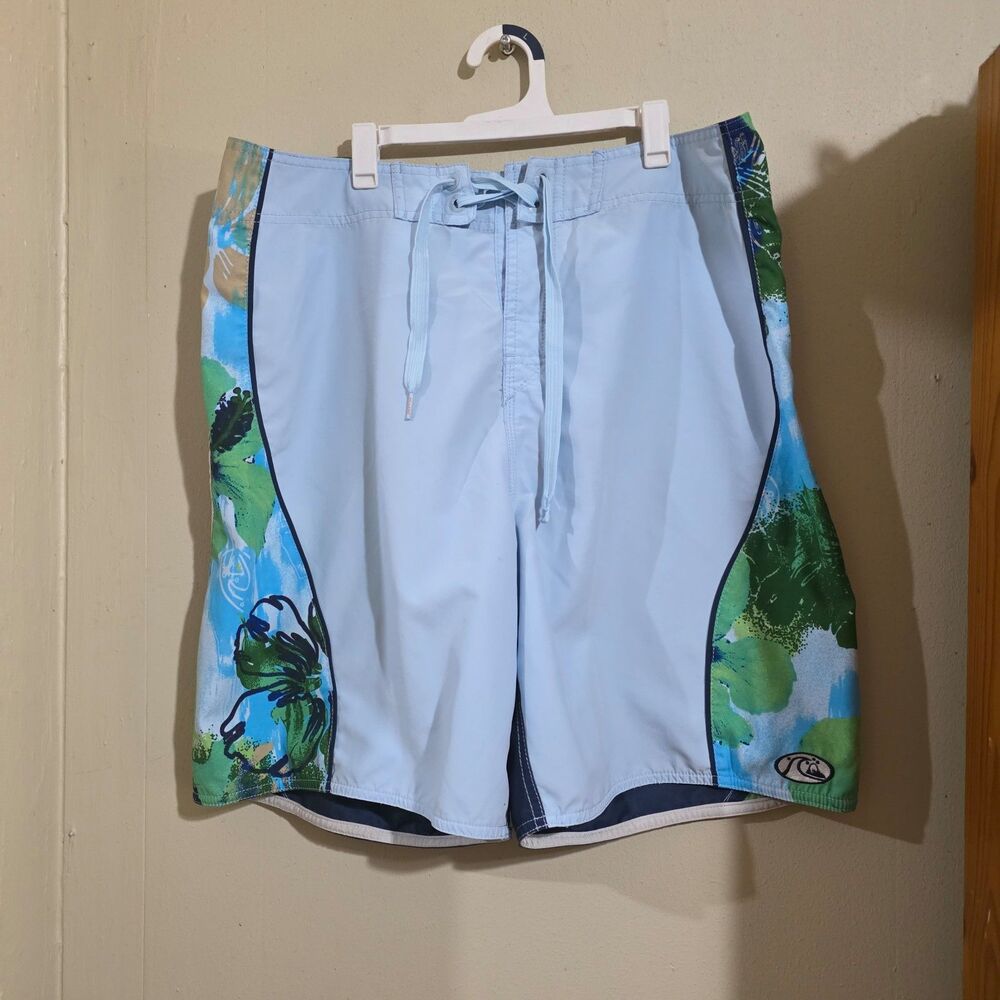 Men's Quicksilver Aqua and green Floral Board Shorts used size 34